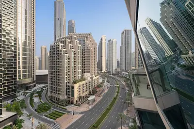 a view of a city with tall buildings at Iconic Burj View 1BR in Burj Vista Tower Near Shops & Metro in Dubai