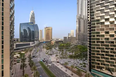 a view of a city with tall buildings at Iconic Burj View 1BR in Burj Vista Tower Near Shops & Metro in Dubai