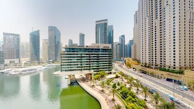 a view of a city with a river and buildings at Bay Central 2 - Charming One Bedroom in Dubai