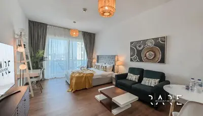 Gallery image of Rare Holiday Homes - Lake View - The Lago Vista Tower A - Dubai Production City - R1503 in Dubai