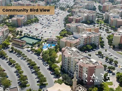 an aerial view of a city with buildings and cars at Rare Holiday Homes - Mediterranean Cluster - Near Ibn Battuta Mall - Discovery Garden - Building# Med 79 - R203 in Dubai