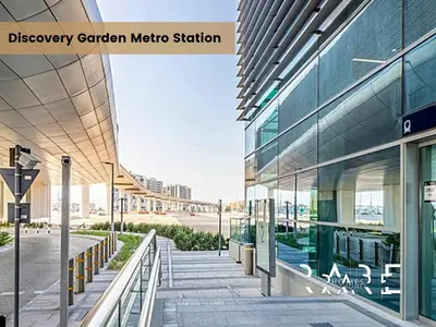 a view of a modern office building with a street at Rare Holiday Homes - Mediterranean Cluster - Near Ibn Battuta Mall - Discovery Garden - Building# Med 100 - RG13 in Dubai