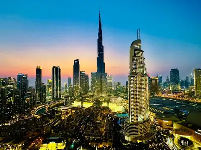 a view of a city skyline at night at Breathtaking Burj View, Sky High Luxury 2BR Apartment by 2nd Best Home in Dubai