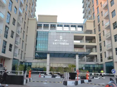 a building with a sign on the side of it at Rare Holiday Homes - Near Madame Tussauds - DEC Tower 1 - Dubai Marina - R2008 in Dubai