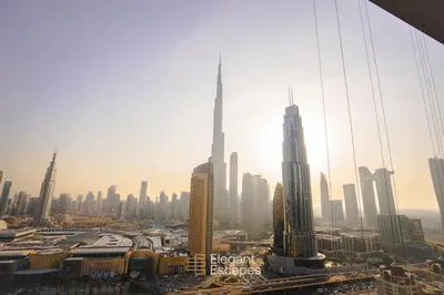 a view of a large city with tall buildings at Stylish 2 BR Apt, Amazing Fountains and Burj Views in Dubai