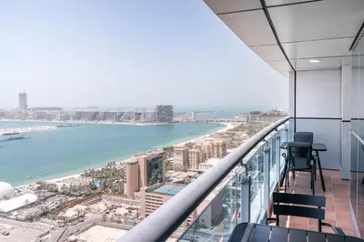a view of the ocean from the top of a building at Blueground Marina Pool Gym DXB-237 in Dubai