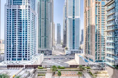 a view of a city with tall buildings at Blueground Marina Gate city view sauna gym DXB-1338 in Dubai