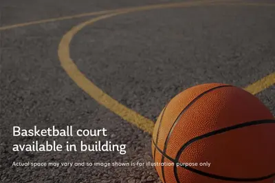 a basketball court with a ball sitting on the ground at Blueground Marina Gate city view sauna gym DXB-1338 in Dubai