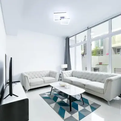 Luxury 3-Bedroom Duplex in Damac Hills & balcony