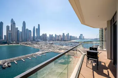 a balcony of a building with a view of a harbor at Dubai Marina Harbour View 2BR with Beach Access in Dubai
