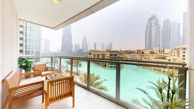a balcony with a view of a swimming pool at The Residences II - One Bed with Burj Khalifa View in Dubai