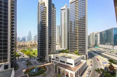a view of a city with tall buildings at Spacious 1BR - Elite Downtown Residence - Short Walk to Burj & Dubai Mall in Dubai