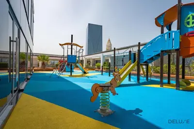 an image of a playground with a slide at Exclusive Studio at Sky Gardens, DIFC by Deluxe Holiday Homes in Dubai