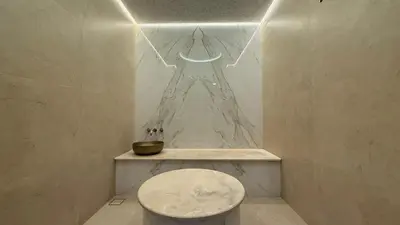 a bathroom with a toilet with a bowl on the wall at Upscale 2BR with Private Terrace & Pool View in Dubai
