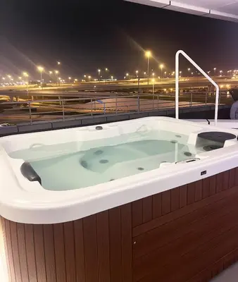 a jacuzzi bath tub with a view of a highway at Stunning Panoramic Sea & Marina City Skyline View in Dubai
