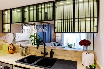 a kitchen with a sink and a window at VIP Experience Dubai Downtown at Boulevard Central T2 - Burj Khalifa View - Modern Luxury Apartments in Dubai