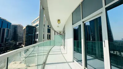 a balcony of a building with a view of the city at Damac Majestine VIP - Manzar Holiday Homes in Dubai