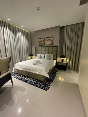 a bedroom with a large white bed and curtains at Damac Majestine VIP - Manzar Holiday Homes in Dubai