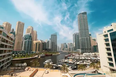 a view of a city with boats in the water at Classic Charm a Studio with Iconic Marina Views in Dubai