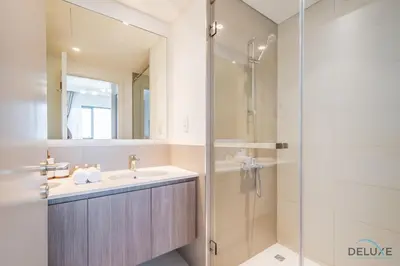 a bathroom with a sink and a shower at Captivating 2BR Apartment in Park Ridge Tower C , Dubai Hills Estate by Deluxe Holiday Homes in Dubai