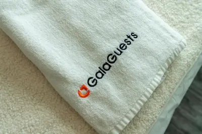 a white towel with the word crookosis on it at Gala Guests - Stunning Front-Row Marina Views at The Point in Dubai