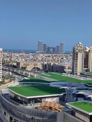 an aerial view of a city with buildings at 7 palm jumeirah West Beach in Dubai