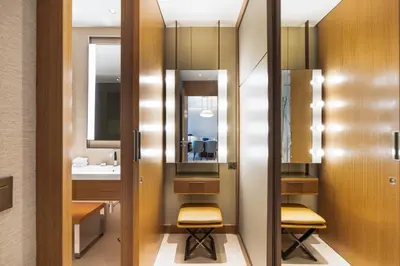 a bathroom with a sink and a mirror at Deluxe Address Opera Home with Full Sea View in Dubai