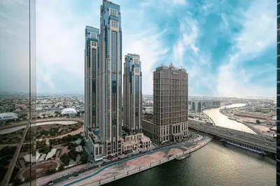 an aerial view of a city with tall buildings at Luxurious 1BR in Court Tower Business Bay in Dubai