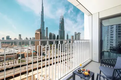 a balcony with a view of a city skyline at Stunning Two-Bedroom Apartment with Skyline View & walk to Dubai Mall by TerraHome in Dubai