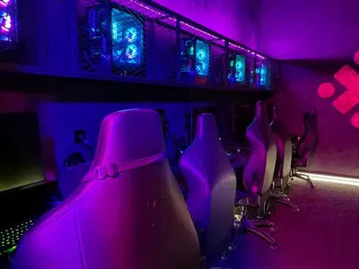a row of purple chairs in a room with lights at New Horizon 2 Bedroom LUXURY APARTMENT JBR MARINA in Dubai