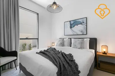 a bedroom with a bed with a blanket on it at Keysplease 4BR Villa walking to pool, Cherrywoods Family Community in Dubai