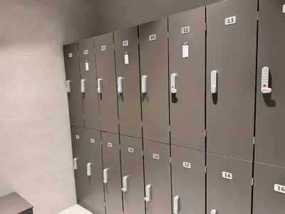 a row of lockers in a locker room at 1 Bedroom with Canal View - 15 Northside in Dubai