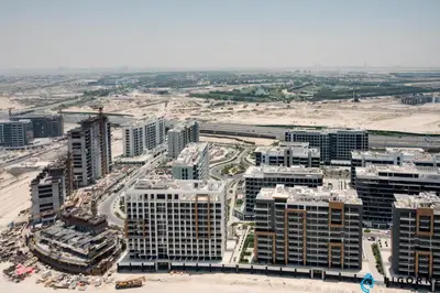 an aerial view of a city with tall buildings at Luxury One BR in Sobha Hartland in Dubai