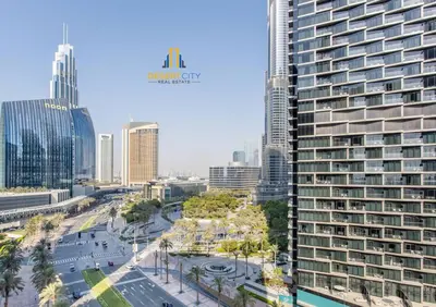 a view of a city with a tall building at Luxurious 2 Bed Next to Burj Khalifa, Hosted by Desert City Stays in Dubai