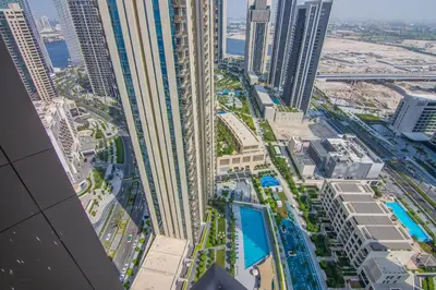 an aerial view of a city with tall buildings at Creekside, Creek Harbour 1 BDR in Dubai