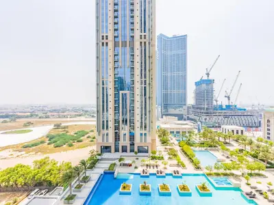 an aerial view of the pool at the hyatt hotel in the city at Prestigious 2BR-Noura Tower- Business Bay in Dubai