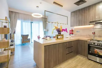 a kitchen with a counter top and a stove at MBL Residences 1 BR, JLT in Dubai