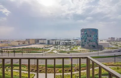 a view of a city from a balcony at Collective 1,0 Dubai Hills- Cozy 1-BR in Dubai