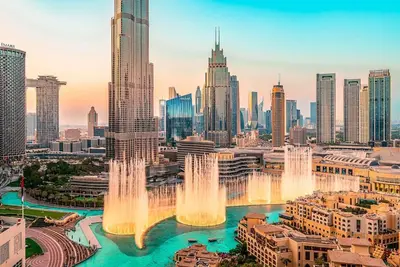 a city skyline with fountains in the water at Elite Royal Apartment - Sky Series - Full Burj Khalifa & Fountain View - Chancellor in Dubai