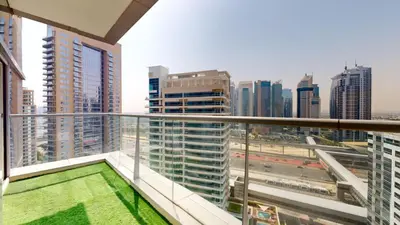 a balcony with a view of a city at Marinascape Oceanic - Luxurious Two Bedroom in Dubai