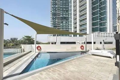 a swimming pool on the roof of a building at Address JBR l Beachfront l Mid floor & opened view in Dubai