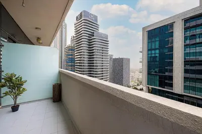 a balcony with a view of a city skyline at Stylish Studio in Heart Downtown Next Dubai Mall in Dubai
