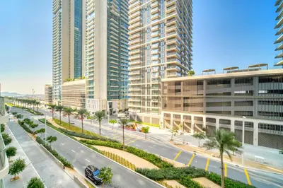 an aerial view of a city street with tall buildings at Luxury 2-Bed Apartment l Emaar Beachfront in Dubai