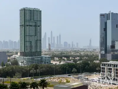 a view of a city skyline with tall buildings at Cloud 9 - DAMAC Ghalia Tower in Dubai