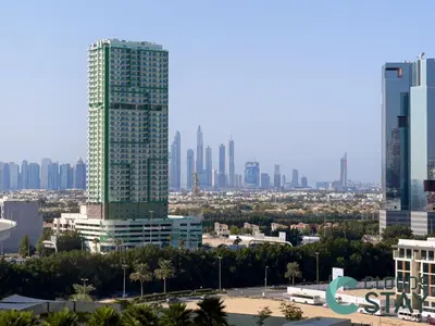 a view of a city skyline with tall buildings at Cloud 9 - DAMAC Ghalia Tower in Dubai