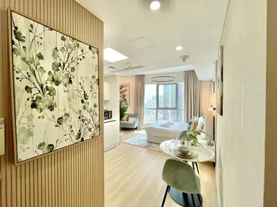a hotel room with a large painting on the wall at Vacay Lettings - Bay Central Tower - Studio in Dubai