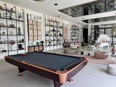 a billiard room with a pool table at Chic 1 BR apartment at Golfville in Dubai