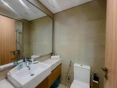 a bathroom with a sink and a toilet at Chic Studio with Balcony, Netflix and Chill Pet-free in Dubai