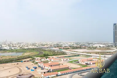 an aerial view of a city with an air strip at Elite Residence - Premium Studio - Best Horse Course View in Dubai