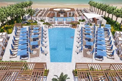an aerial view of a resort with a swimming pool at LA VIE JBR, Sea & Palm View Apartment in Dubai